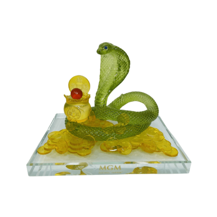 Silverstone Design custom glass figurine of a snake for MGM Resorts Lunar New Year collection, symbolizing prosperity and artistry.