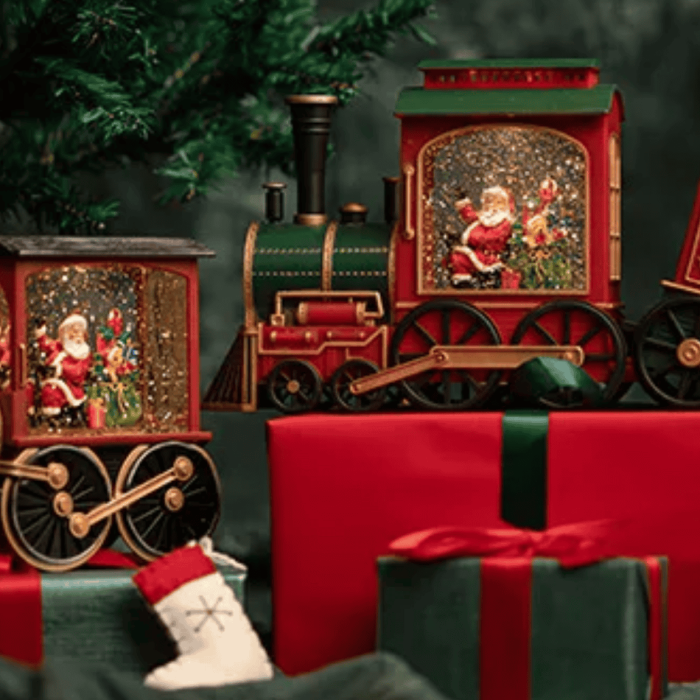 SNOW GLOBE OF TRAIN ENGINE AND TRAIN WITH CAR